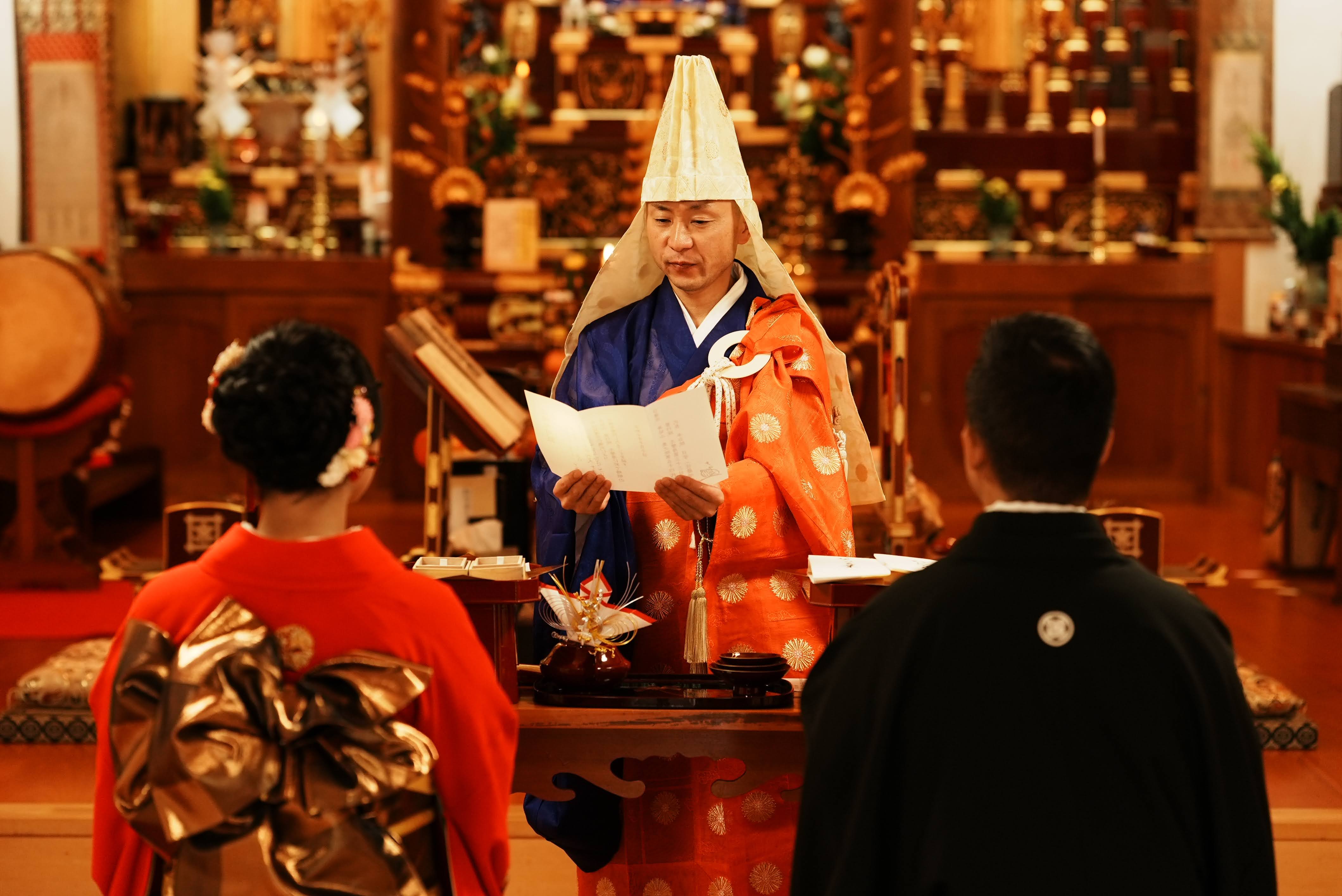 Buddhist monk performing Japan temple wedding ceremony