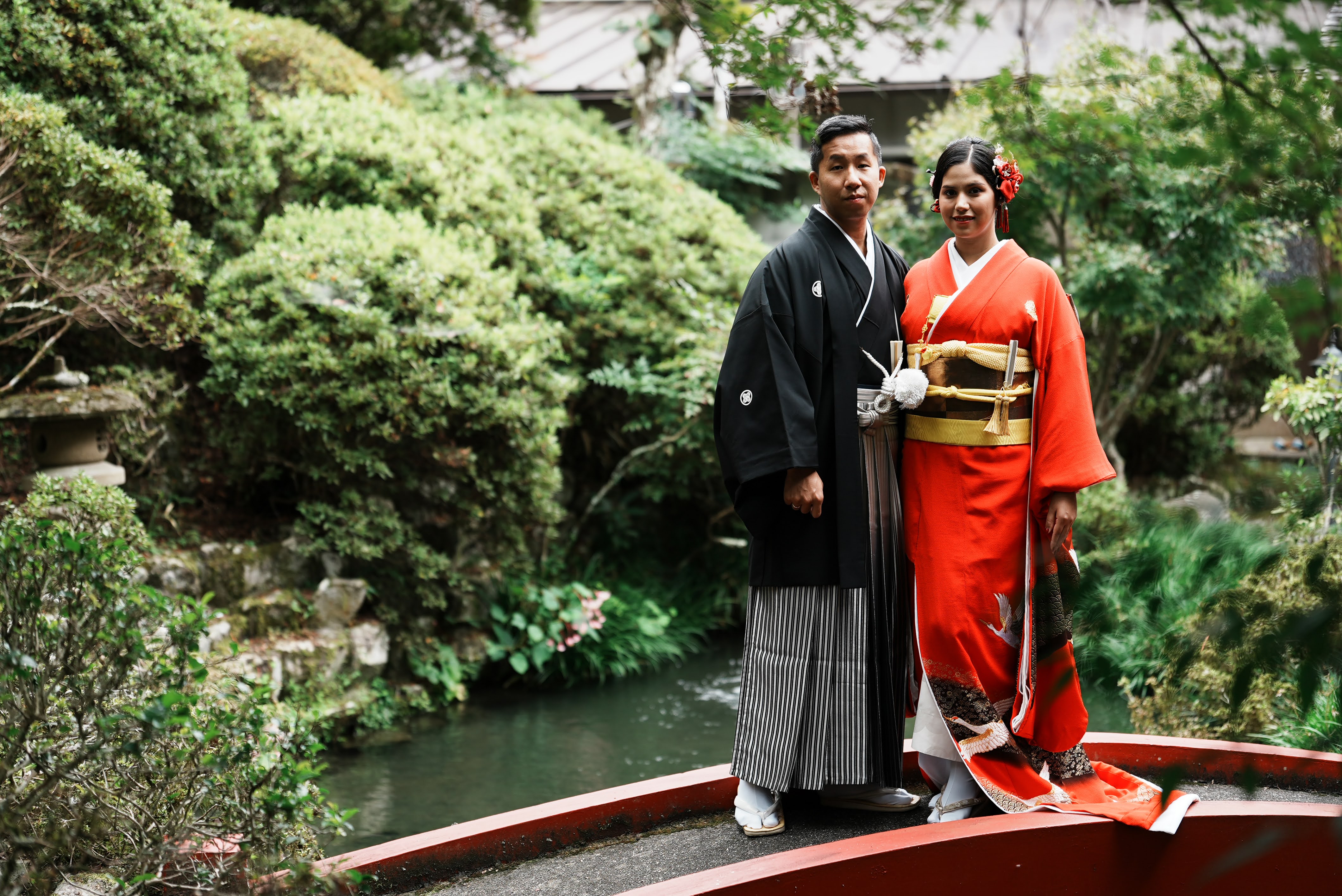 Wedding couple in traditional Japanese temple garden